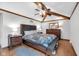 Bedroom with vaulted ceilings, wooden beams, and ample closet space at 8525 Winding Ridge Rd, Indianapolis, IN 46217