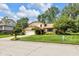 Charming home featuring lush landscaping, a manicured lawn, and a classic design at 8525 Winding Ridge Rd, Indianapolis, IN 46217