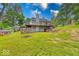 Two-story home with spacious back deck perfect for outdoor entertaining and relaxing at 8635 S Providence Dr, Nineveh, IN 46164