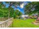 Lush backyard with a view of the lake and private dock at 8635 S Providence Dr, Nineveh, IN 46164