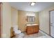 Full bathroom features a vanity with wood cabinets and marble countertop at 8635 S Providence Dr, Nineveh, IN 46164