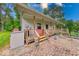 Inviting front porch with classic design elements and a relaxing outdoor seating area at 8635 S Providence Dr, Nineveh, IN 46164