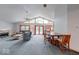 Open concept living room with vaulted ceilings and lake views at 8635 S Providence Dr, Nineveh, IN 46164
