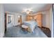 Spacious main bedroom boasting neutral paint, carpet and natural wood trim at 8635 S Providence Dr, Nineveh, IN 46164