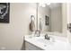 Stylish bathroom boasts a vessel sink, modern hardware, and elegant decor at 9643 Cypress Way, Carmel, IN 46032