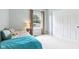Serene bedroom with carpet flooring, and ample natural light creating a cozy and relaxing space to unwind at 9643 Cypress Way, Carmel, IN 46032
