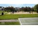 A fun community playground area with slides, swings, and play structures set in a grassy, park-like setting at 9643 Cypress Way, Carmel, IN 46032