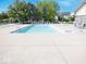 Sparkling community pool with ample seating and lounge chairs for residents to enjoy the summer sun at 9643 Cypress Way, Carmel, IN 46032
