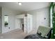 Bedroom featuring a loft bed, study area, and a comfortable chair near a window at 9775 Big Bend Dr, Indianapolis, IN 46234