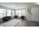 Bright living room showcasing modern furniture, multiple windows, and chic decor at 9775 Big Bend Dr, Indianapolis, IN 46234