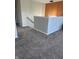 Hallway featuring neutral paint, plush carpet, modern pendant lighting, and stylish railings at 10218 Arctic Edge Dr, Indianapolis, IN 46259
