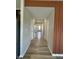 Inviting hallway with wood-look floors, neutral paint, and contemporary style at 10218 Arctic Edge Dr, Indianapolis, IN 46259