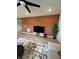 Stylish living room features a media center and a textured accent wall at 10218 Arctic Edge Dr, Indianapolis, IN 46259
