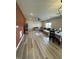 Open-concept living space with modern accents, a large sectional, and an inviting atmosphere at 10218 Arctic Edge Dr, Indianapolis, IN 46259