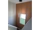 Bright stairway showcasing modern pendant lighting, a view of the lawn, and neutral paint at 10218 Arctic Edge Dr, Indianapolis, IN 46259