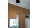 Bright staircase features modern pendant lighting and a view of the lawn with neutral paint at 10218 Arctic Edge Dr, Indianapolis, IN 46259