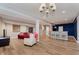Finished basement with a bar area, comfortable seating, and modern lighting at 11074 Galley Way, Fishers, IN 46040