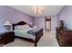 Bedroom featuring a comfortable bed, natural light, and traditional furnishings at 11074 Galley Way, Fishers, IN 46040