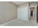 This bedroom features neutral colored walls, carpet, and a closet with sliding doors at 11074 Galley Way, Fishers, IN 46040