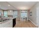 Well-lit dining room with view of kitchen and fireplace at 11074 Galley Way, Fishers, IN 46040