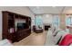 Cozy living room features a fireplace, built-in shelving, and a comfortable seating area at 11074 Galley Way, Fishers, IN 46040