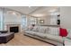 Cozy living room with hardwood floors and fireplace at 11074 Galley Way, Fishers, IN 46040
