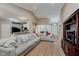 Bright, open-concept living room featuring vaulted ceilings, hardwood floors and neutral color palette at 11074 Galley Way, Fishers, IN 46040