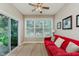 Bright sun room featuring a sliding glass door, large windows, and comfortable seating at 11074 Galley Way, Fishers, IN 46040