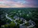 Expansive neighborhood aerial showcasing well-maintained homes and lush green landscape at 12450 Petalon Trce, Fishers, IN 46037