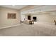 Finished basement with plush carpet, recessed lighting, and plenty of open space at 12450 Petalon Trce, Fishers, IN 46037
