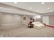 Spacious finished basement with plush carpeting, recessed lighting, and ample room for recreation at 12450 Petalon Trce, Fishers, IN 46037