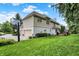 Two-story home featuring an attached two car garage, basketball court, and large backyard at 12450 Petalon Trce, Fishers, IN 46037