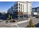 Modern building with outdoor seating, featuring sleek architecture and convenient parking spaces at 12450 Petalon Trce, Fishers, IN 46037