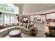 This comfortable living room flows to the kitchen and dining nook at 12450 Petalon Trce, Fishers, IN 46037