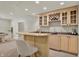 Finished basement featuring a wet bar with cabinets, countertop space, and a sink at 13757 Flintridge Pass, Carmel, IN 46033