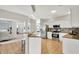 Well-lit kitchen with stainless steel appliances and mosaic tile backsplash at 13757 Flintridge Pass, Carmel, IN 46033