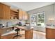 Cozy home office featuring built-in cabinets, desk space, and a large window at 13757 Flintridge Pass, Carmel, IN 46033