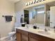 Bathroom features a double vanity and a large mirror at 13859 Keams Dr, Fishers, IN 46038