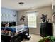 bedroom featuring fun superhero decor, a window and closet at 13859 Keams Dr, Fishers, IN 46038