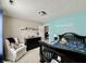 Charming bedroom featuring a crib, rocking chair, and playful decor at 13859 Keams Dr, Fishers, IN 46038