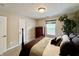 Bedroom featuring a dark wood, four poster bed and a large window at 13859 Keams Dr, Fishers, IN 46038