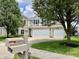 Charming two-story home features brick and vinyl siding, dark shutters, and a spacious three-car garage at 13859 Keams Dr, Fishers, IN 46038