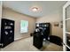 Cozy home office features a large window, modern furnishings, and neutral paint at 13859 Keams Dr, Fishers, IN 46038