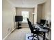 Home office featuring a large desk and a window for natural light at 13859 Keams Dr, Fishers, IN 46038