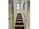 Carpeted staircase with a window at 13859 Keams Dr, Fishers, IN 46038