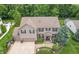 A large home in a serene setting, boasting a well-kept lawn, ample parking, and inviting curb appeal at 1393 Turfway Dr, Avon, IN 46123