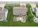 Aerial view of the backyard featuring a landscaped patio with a fire pit at 1393 Turfway Dr, Avon, IN 46123