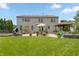 Beautiful backyard with large patio, outdoor kitchen, and seating at 1393 Turfway Dr, Avon, IN 46123