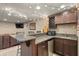 Basement bar features granite counters, custom cabinets and stainless appliances at 1393 Turfway Dr, Avon, IN 46123
