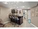 Finished basement bar features custom cabinets, granite counters and seating for entertaining at 1393 Turfway Dr, Avon, IN 46123